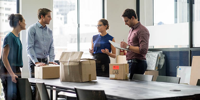 People and boxes in an office